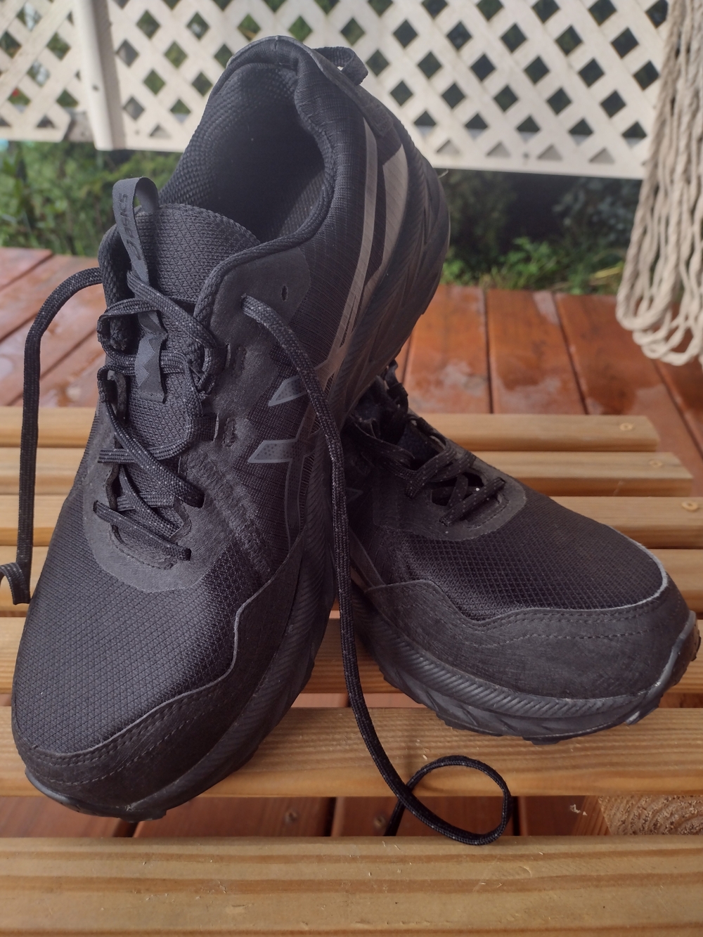 Asics Men's Black Athletic Sneakers with Subtle Reflective Accents